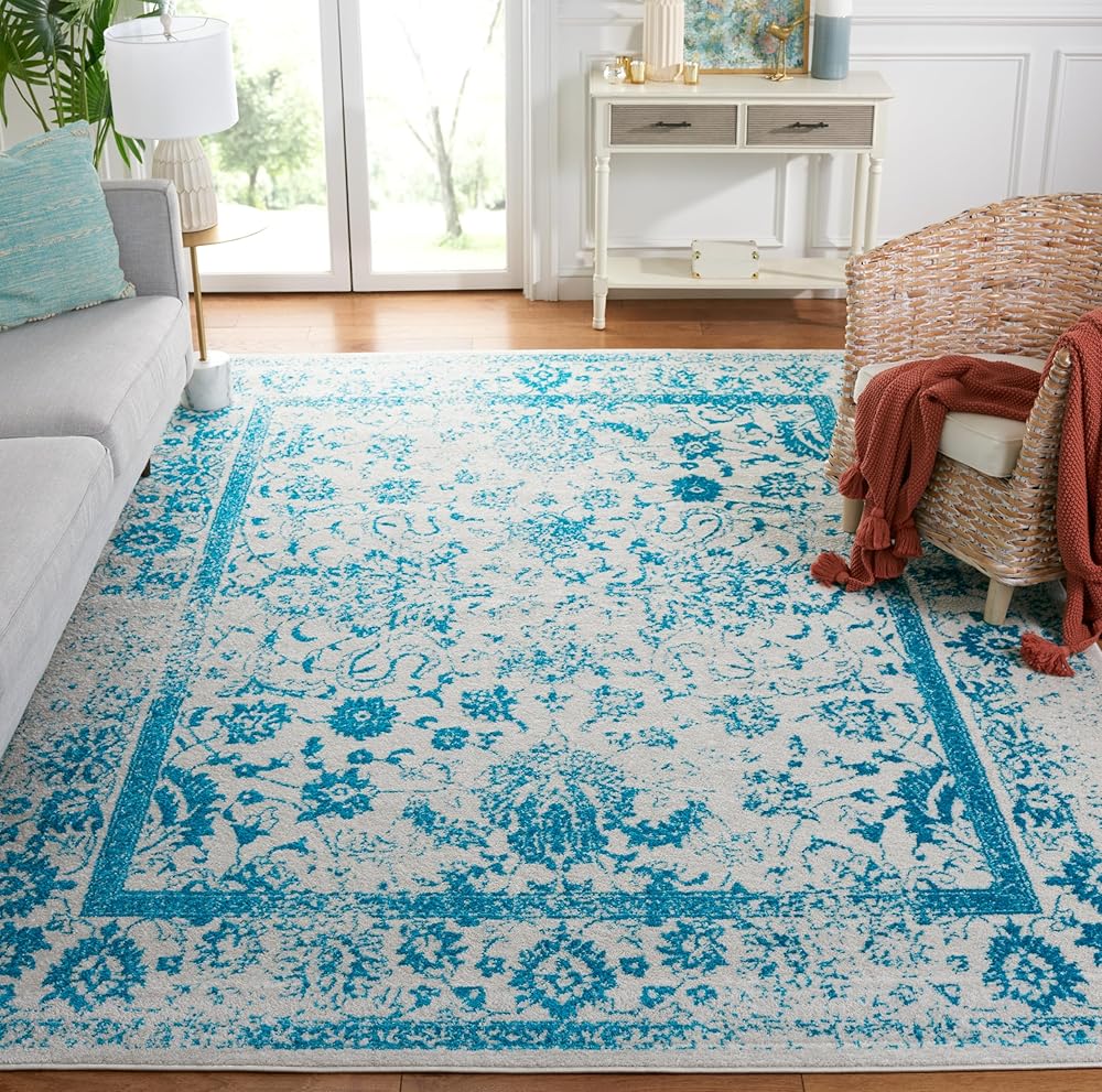 SAFAVIEH Adirondack Collection Area Rug - 9' x 12', Ivory & Teal, Oriental Distressed Design, Non-Shedding & Easy Care, Ideal for High Traffic Areas in Living Room, Bedroom (ADR109D)